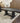 5243 - **AS-IS**  7' trestle table cannella - jade