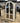 4946 - arched top vitrine with dwrs white wheat