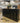 4982 - three drawer six glass door black diamond console