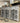 4983 - three drawer six glass door marble breakfront console