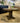 4998 - 48" round pedestal table tobacco