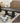 5243 - **AS-IS**  7' trestle table cannella - jade