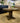 4998 - 48" round pedestal table tobacco
