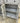 4983 - three drawer six glass door marble breakfront console